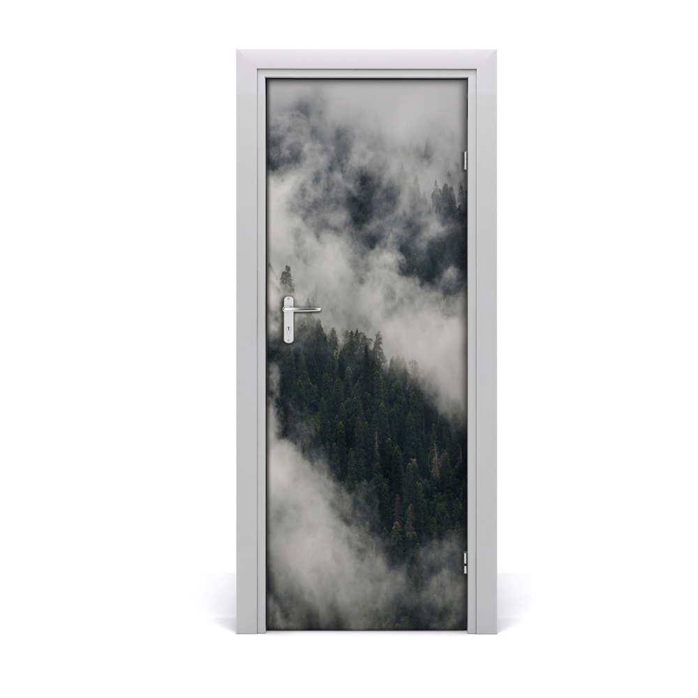 Sticker de porte Nuages au-dessus d'une forêt dense