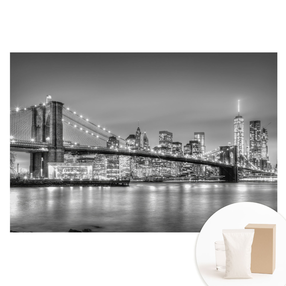 Papier peint panoramique intissé représentant une vue nocturne de métropole avec pont et gratte-ciel