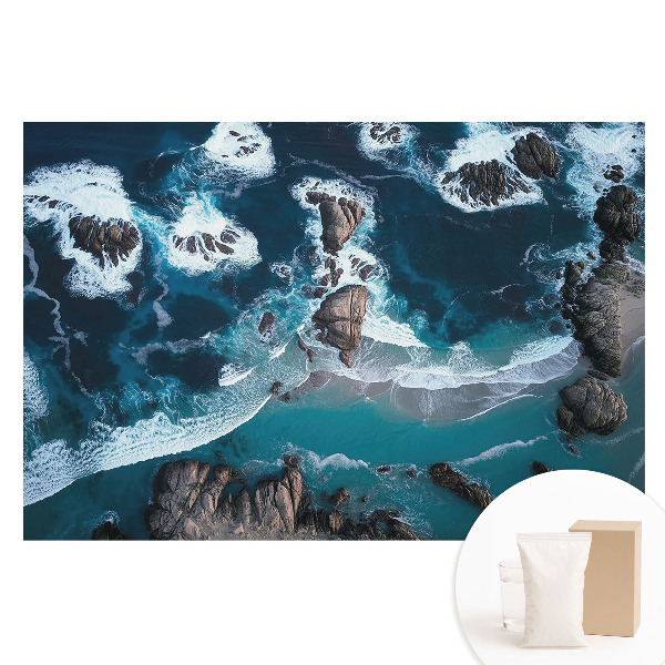 Papier peint photographique intissé Vue aérienne de l'océan et des rochers aux couleurs éclatantes