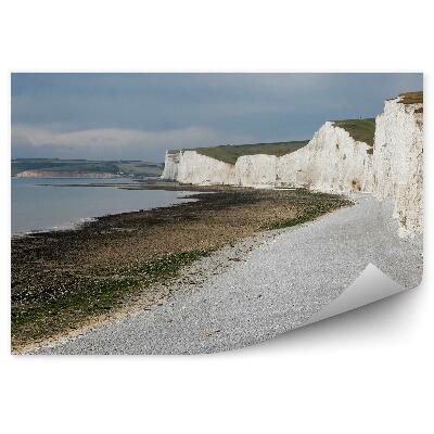 Papier peint Rochers Océan Ciel Nuages Béton Herbe