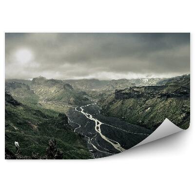 Papier peint Paysage sombre collines rivière ciel nuageux