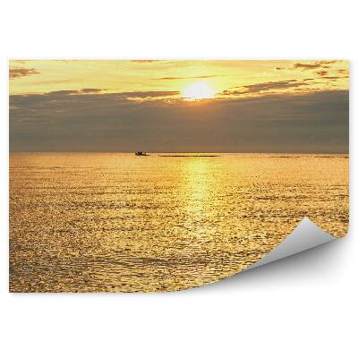 Papier peint Eau de la mer Baltique Nuages sur ciel orange