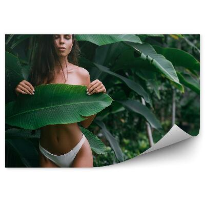 Papier peint Brune recouverte d'une grande feuille nature