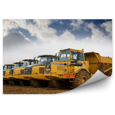 Papier peint Rangée de camions à benne sur fond de ciel