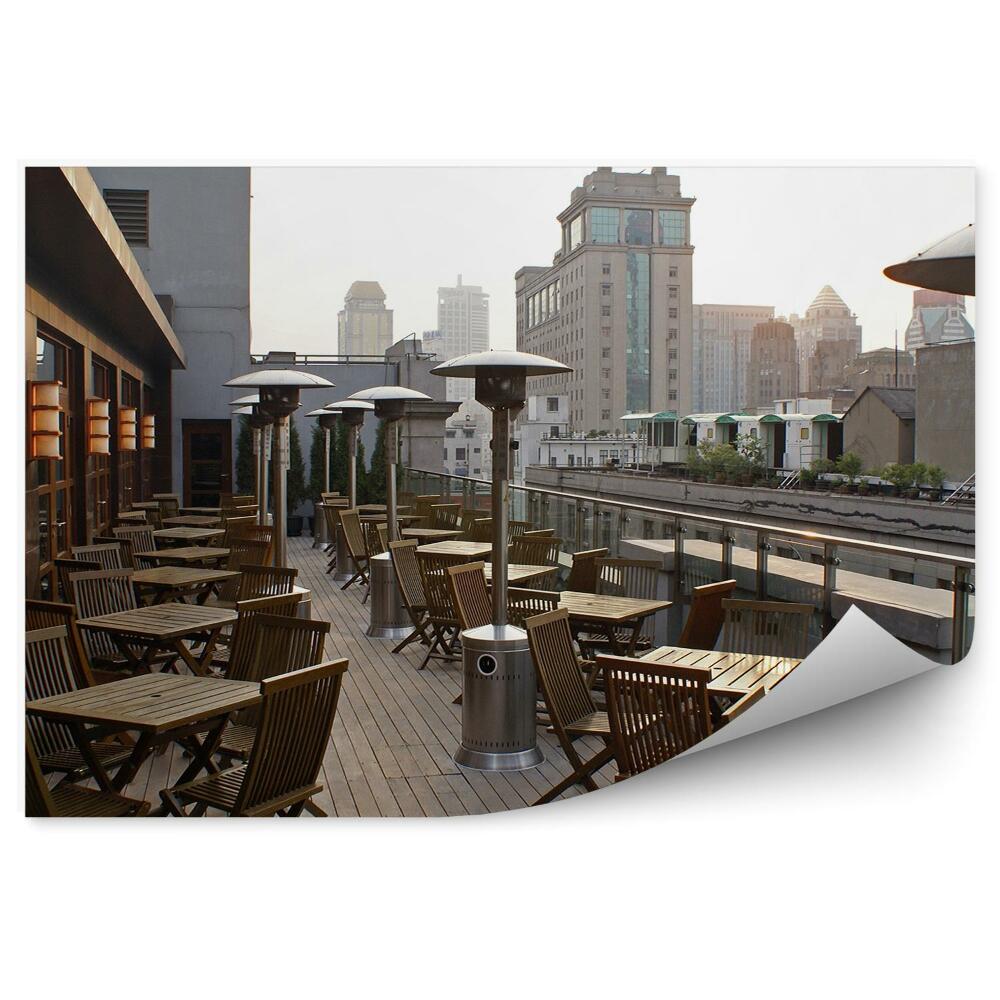 Papier peint Bâtiments Terrasse Chaises Tables Lampes Ciel