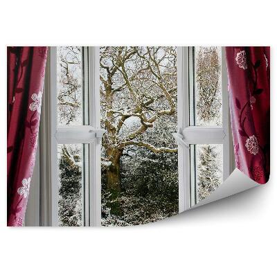 Papier peint Rideau d'une fenêtre ouverte et arbres enneigés