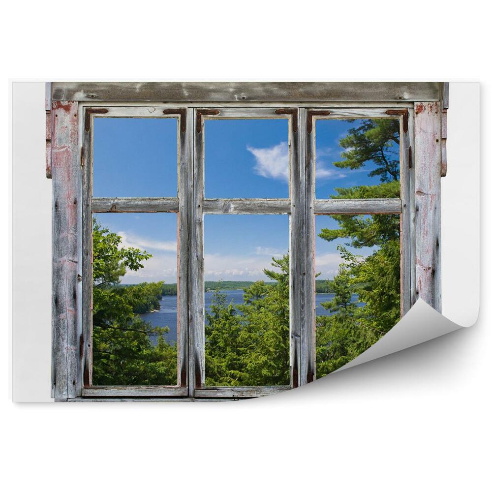 Papier peint Vue pittoresque à travers le cadre d'une vieille fenêtre