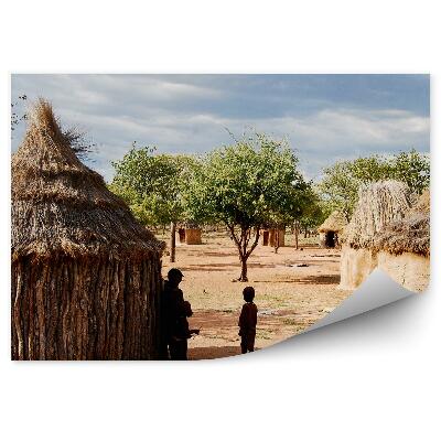 Papier peint Villages Himba Arbres Nuages de ciel Maisons africaines