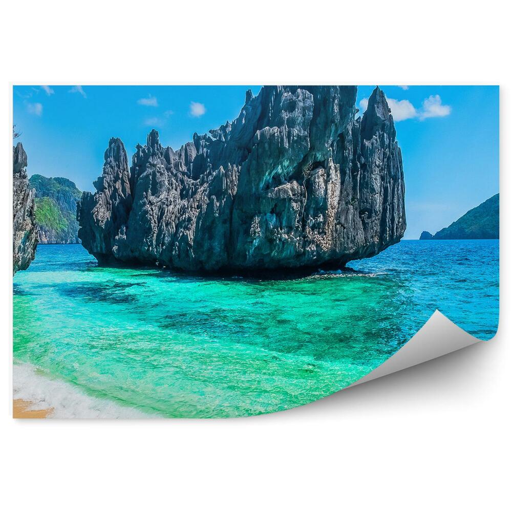 Papier peint Rochers Plantes Plage Océan Ciel Nuages