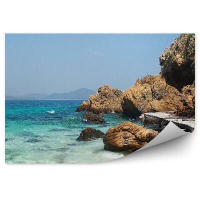 Papier peint passerelle vagues collines rochers