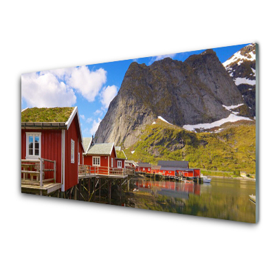 Tableau photo sur verre Chalets sur un lac de montagne