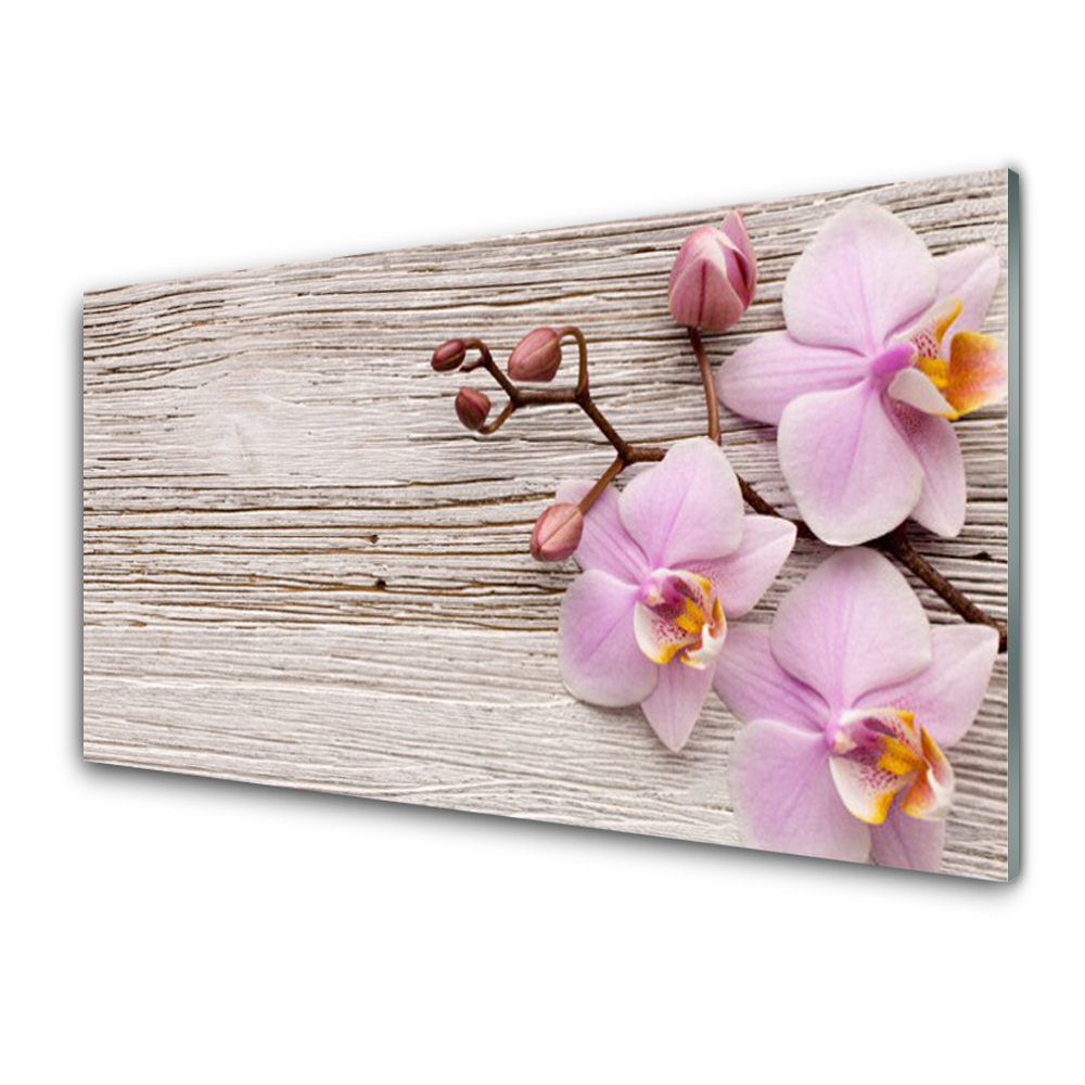 Tableau en verre Orchidées roses sur une planche