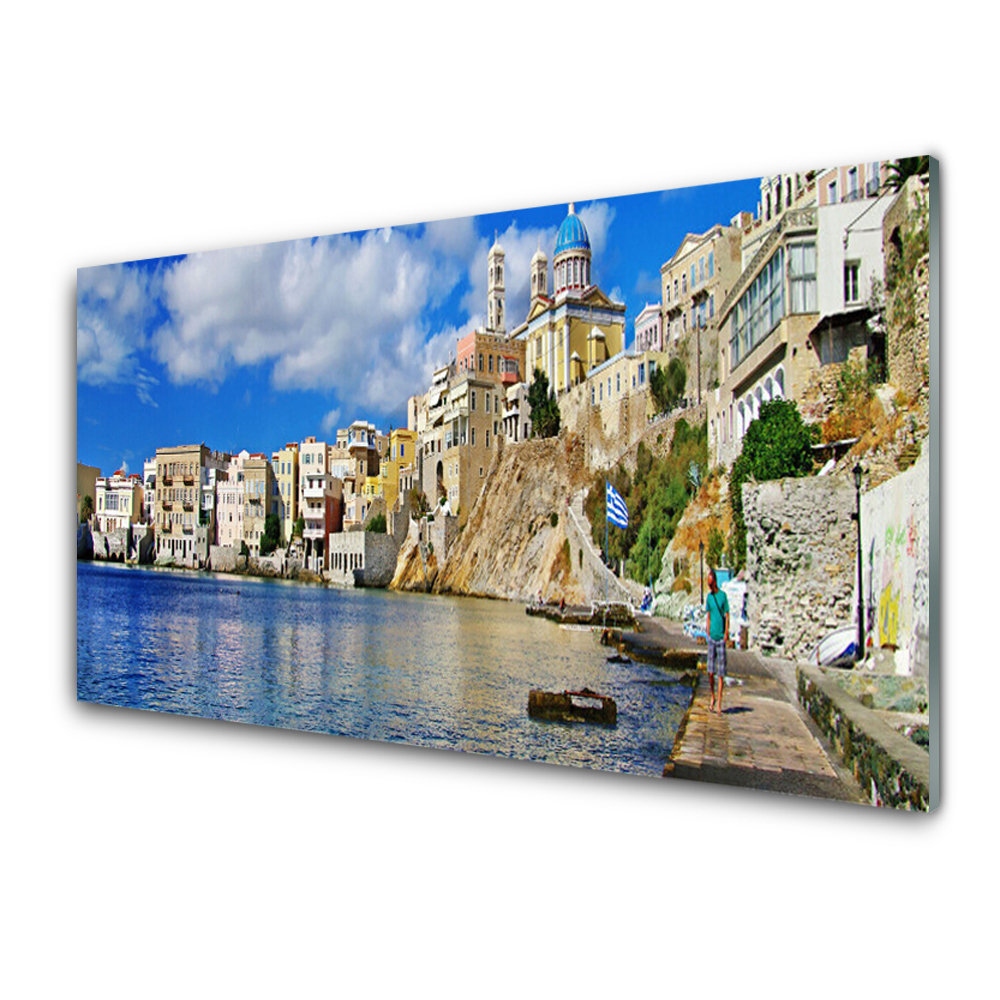 Tableau photo sur verre Ville sur un rocher au bord de la mer