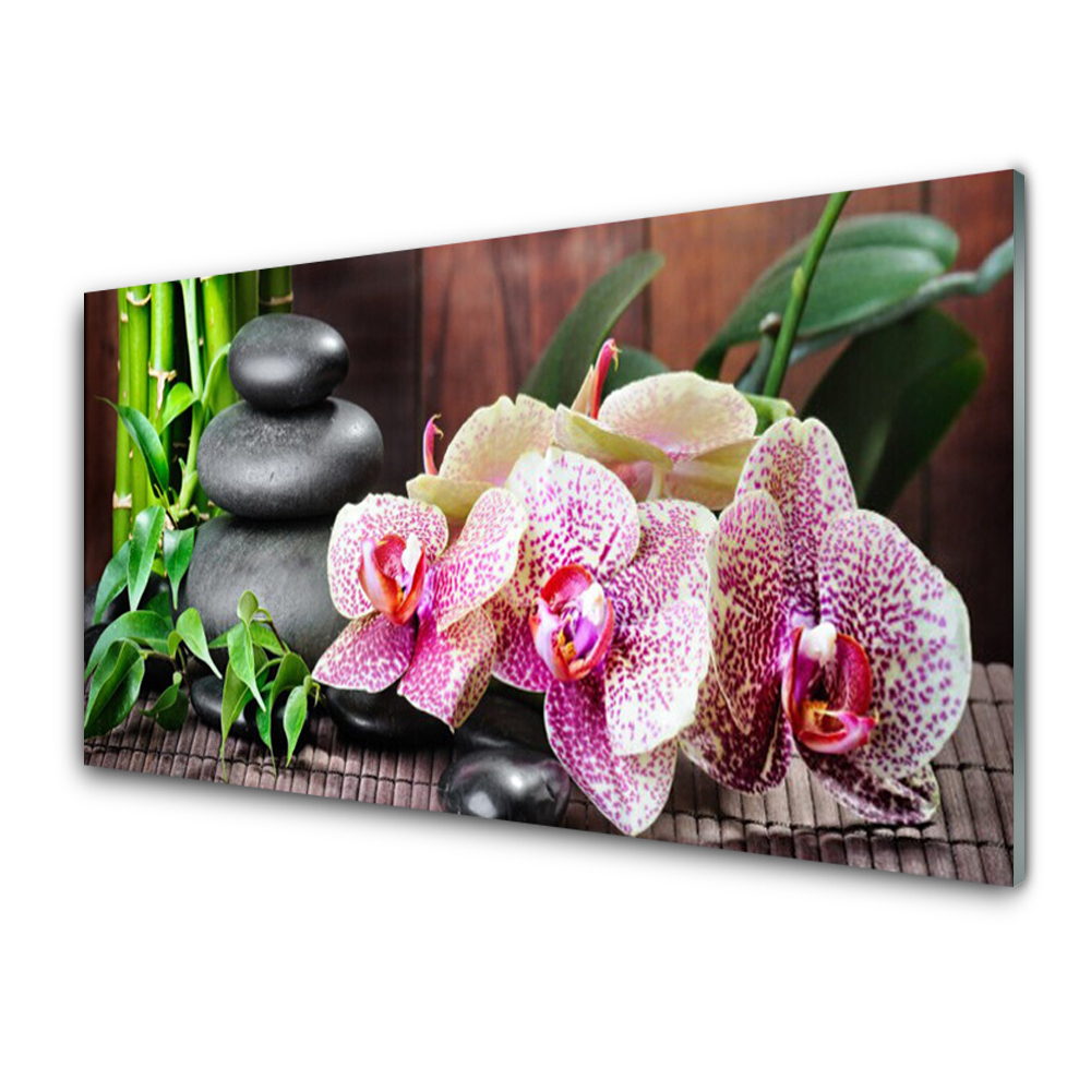 Tableau sur verre Orchidée et pierres sur tapis