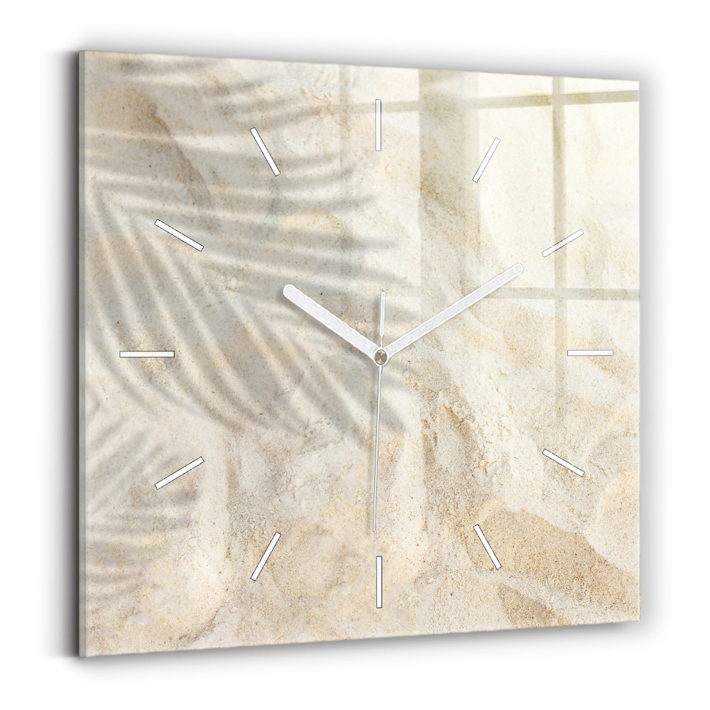 Horloge murale carrée Ombre d'un palmier sur le sable