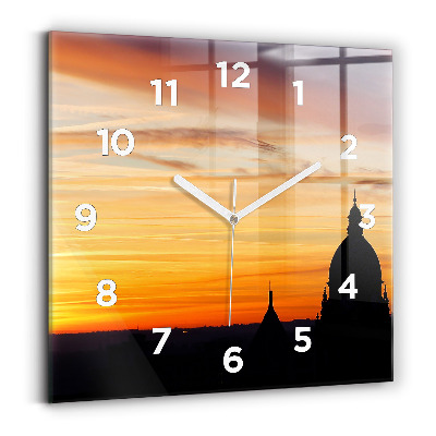 Horloge carrée en verre Bâtiment et coucher de soleil