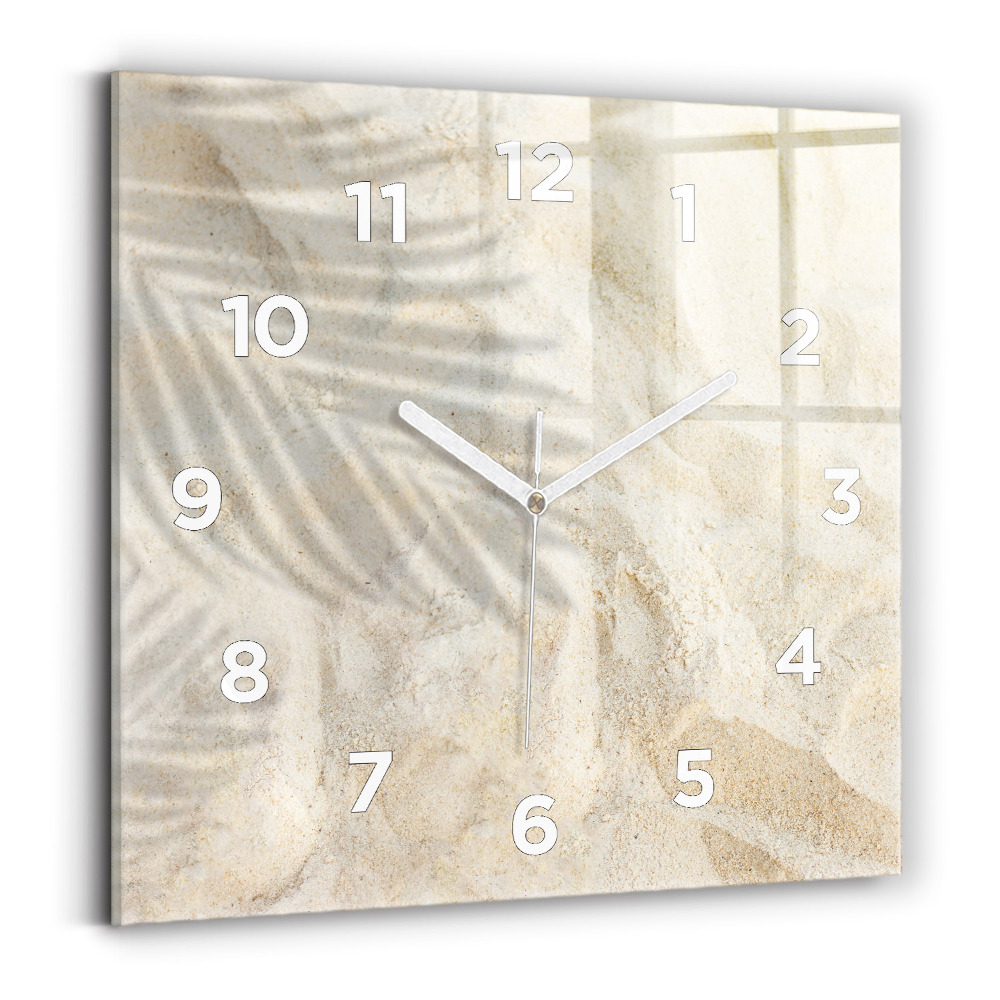 Horloge murale carrée Ombre d'un palmier sur le sable