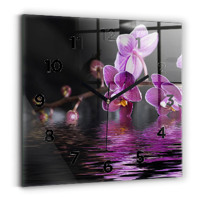 Horloge carrée en verre Fleur d'orchidée sur l'eau