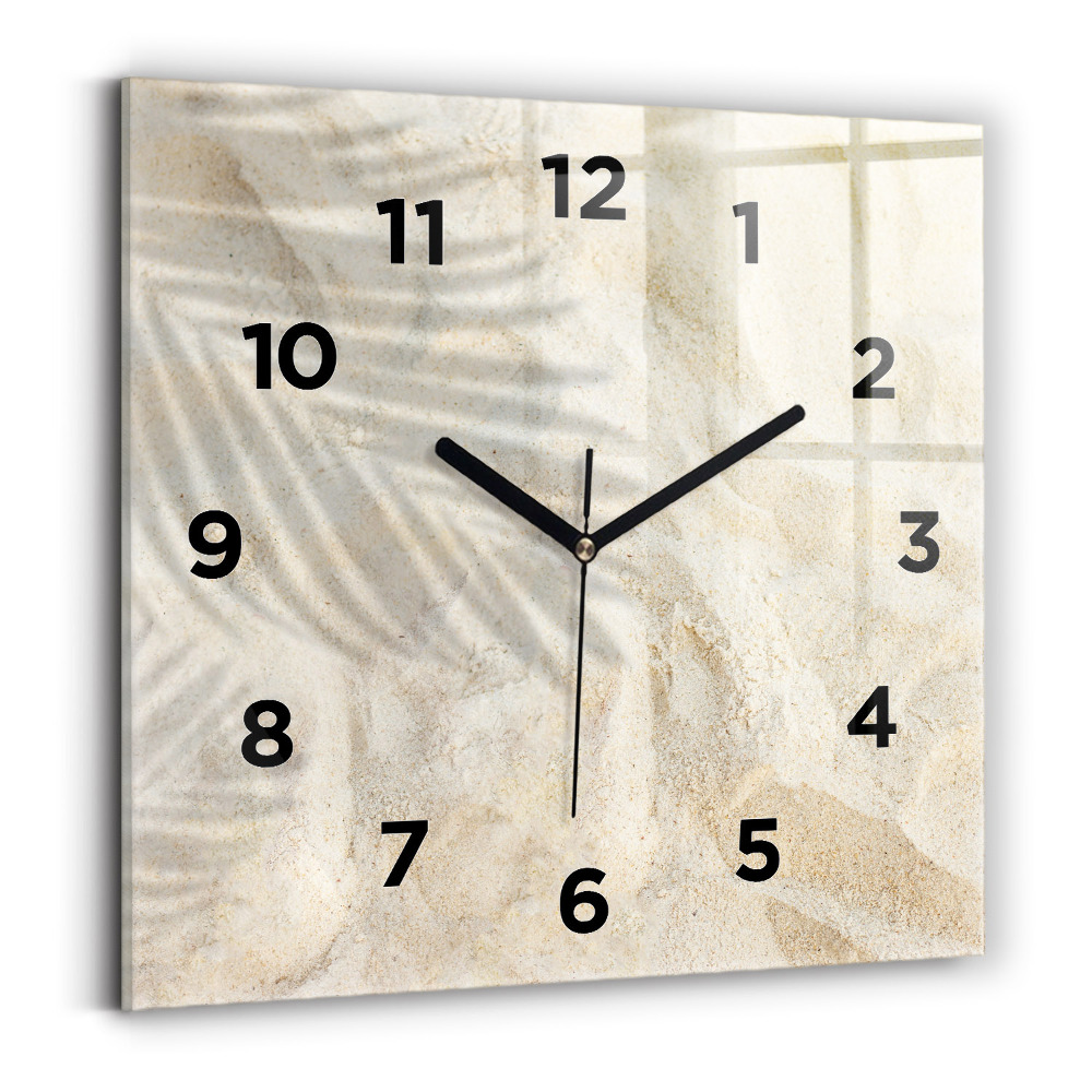Horloge murale carrée Ombre d'un palmier sur le sable