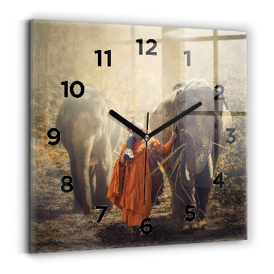 Horloge carrée en verre Moine guidant des éléphants
