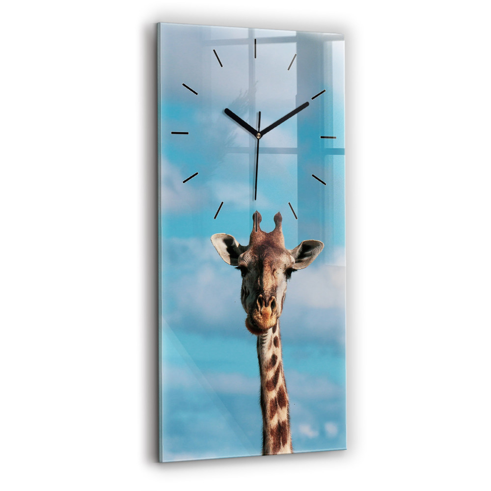 Horloge murale verticale Tête de girafe sur fond de ciel