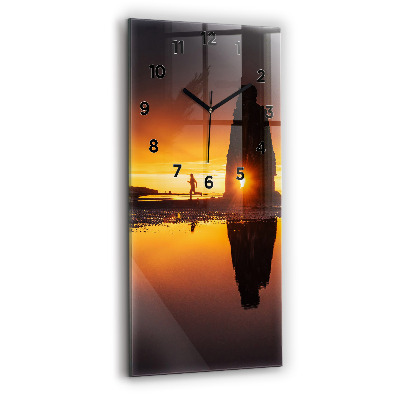 Horloge rectangulaire verticale Coureur et coucher de soleil