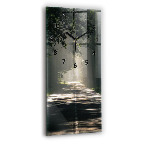 Horloge verticale en verre Route forestière et traînées de soleil