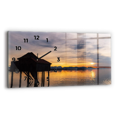 Horloge murale horizontale Coucher de soleil sur un lac