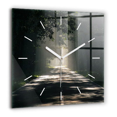 Horloge murale carrée 60x60 cm Route forestière et traînées de soleil