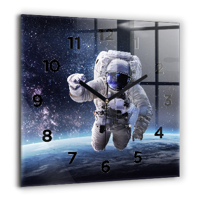 Horloge murale carrée 60x60 cm Astronaute au-dessus du sol