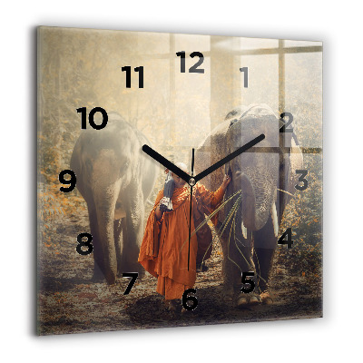 Horloge carrée en verre 60x60 cm Moine guidant des éléphants