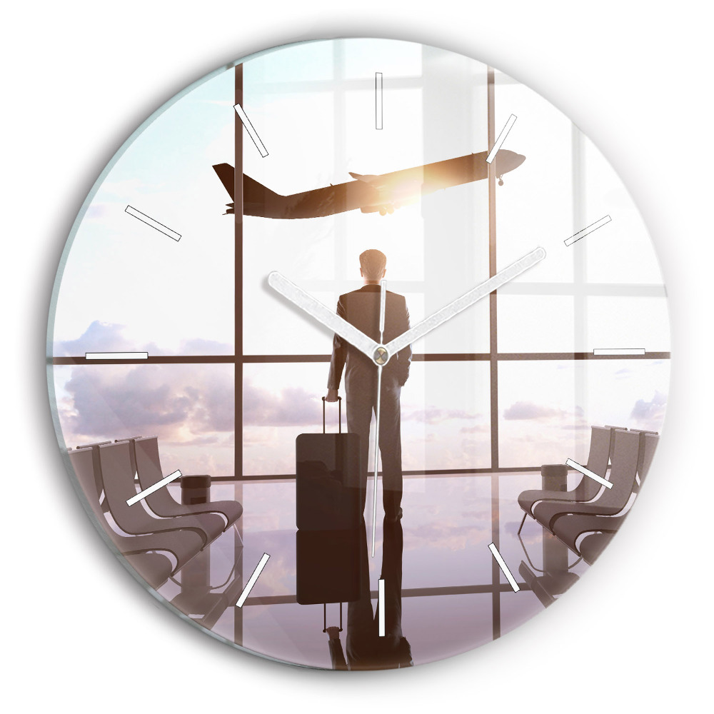 Horloge ronde en verre Homme à l'aéroport