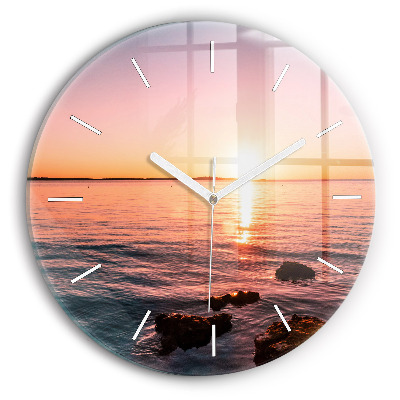 Horloge ronde en verre Rochers au coucher du soleil