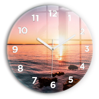 Horloge ronde en verre Rochers au coucher du soleil