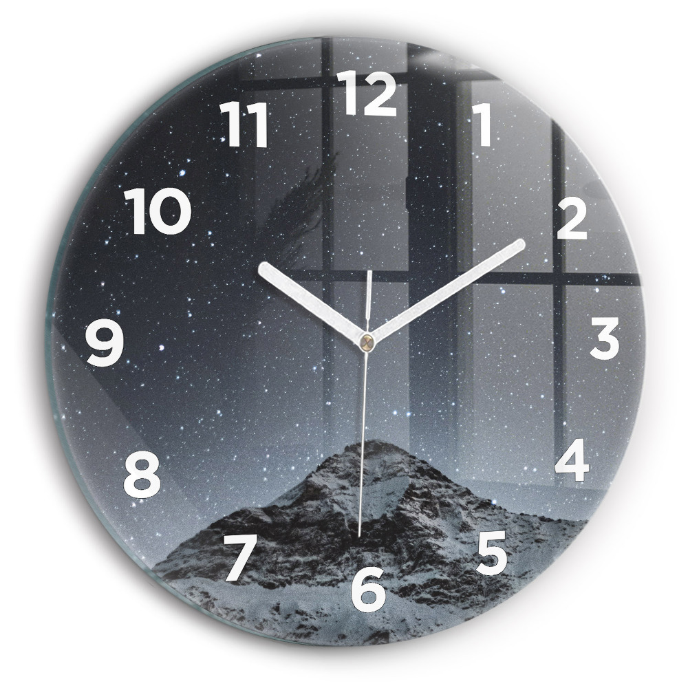 Horloge ronde Montagne sous les étoiles