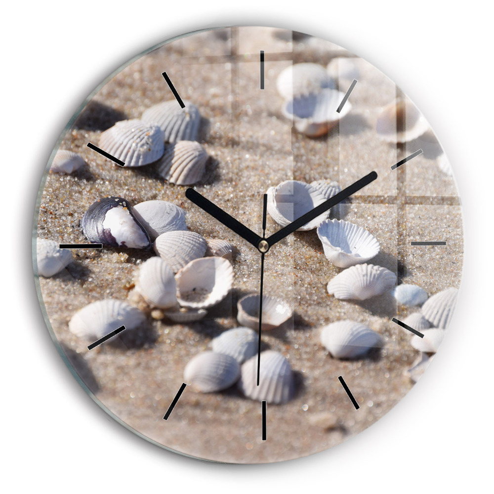 Coquillages sur la plage Horloge ronde en verre