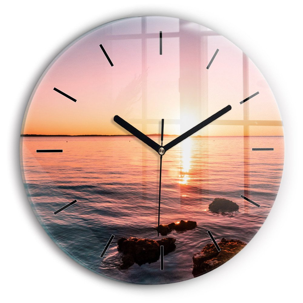 Rochers au coucher du soleil Horloge ronde en verre