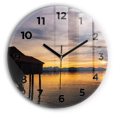 Horloge ronde Coucher de soleil sur un lac