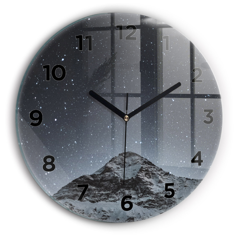 Horloge ronde Montagne sous les étoiles