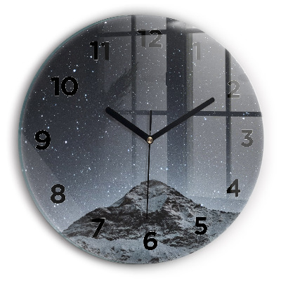 Horloge ronde Montagne sous les étoiles