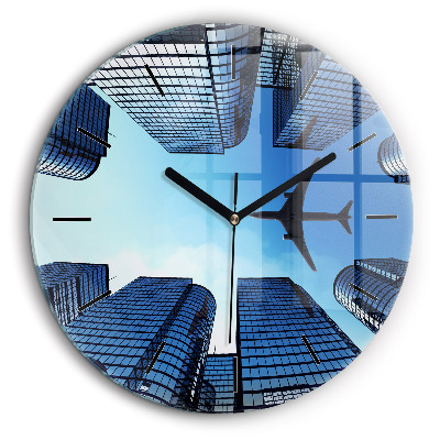 Horloge ronde murale 60 cm Avion au-dessus de bâtiments